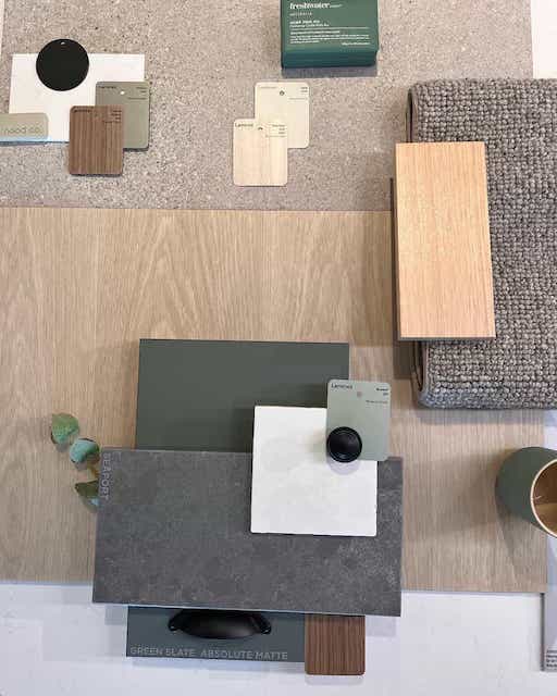 Flatlay with wood, grey tile, grey paint